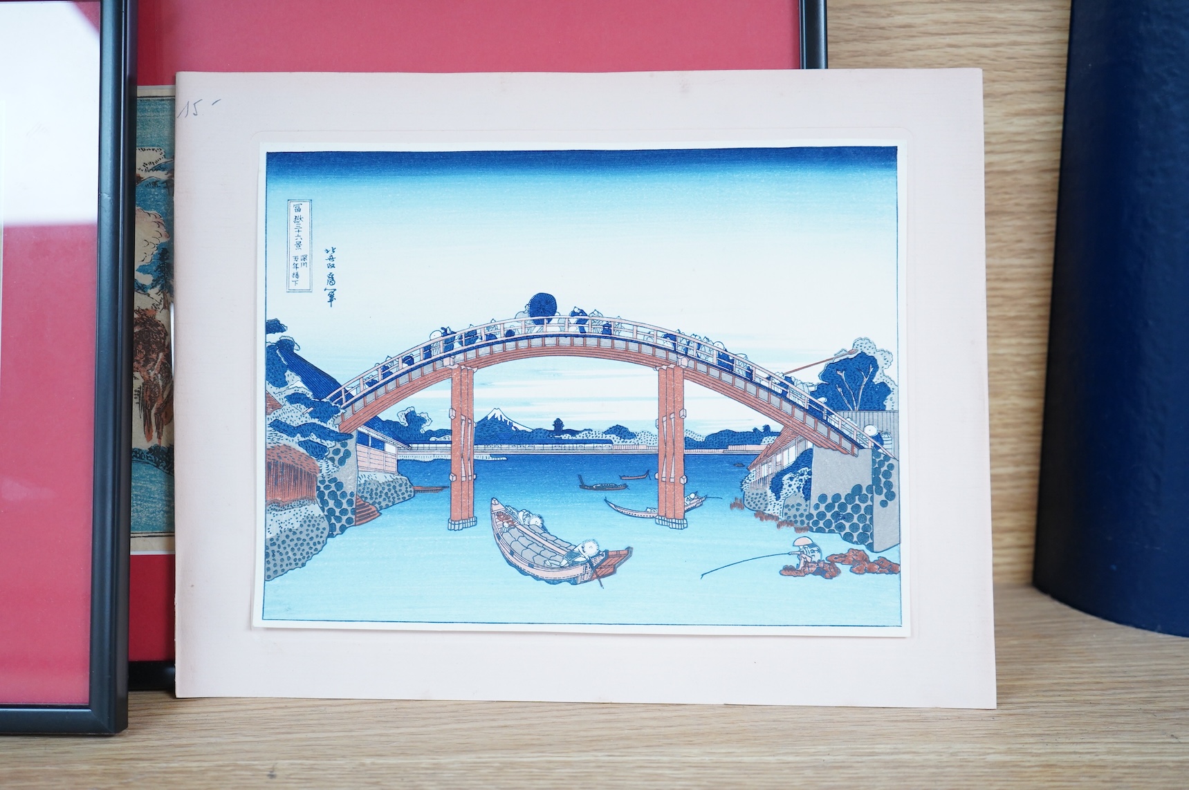 A set of four Japanese woodblock later reprints, Winter scenes, together with a later example, 18 x 25cm